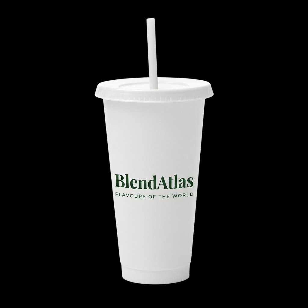 BlendAtlas signature reusable cup — tall white takeaway silhouette with matching lid and straw, BlendAtlas wordmark and Flavours of the World tagline in forest green